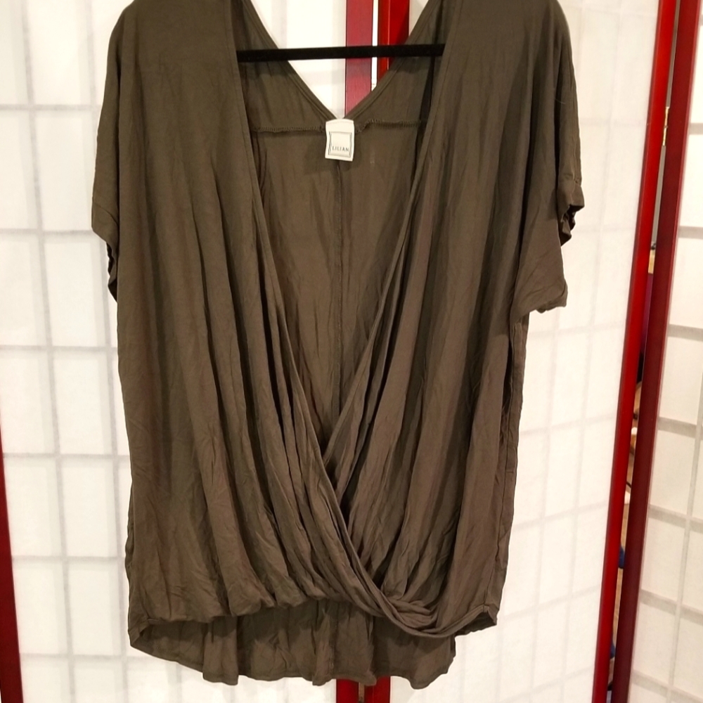 Crossover front hi/lo blouse.